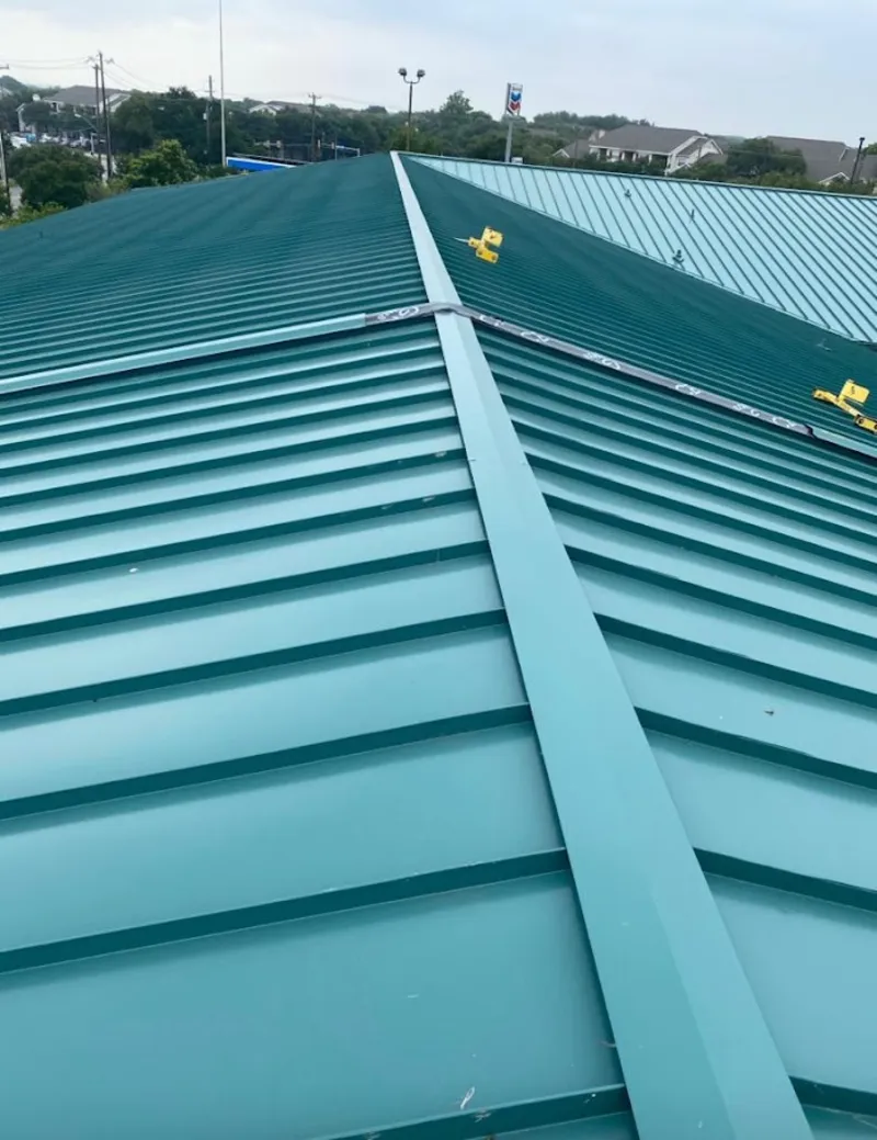Green commercial metal roof ridge and valley for Metal Roof Repair in Preston